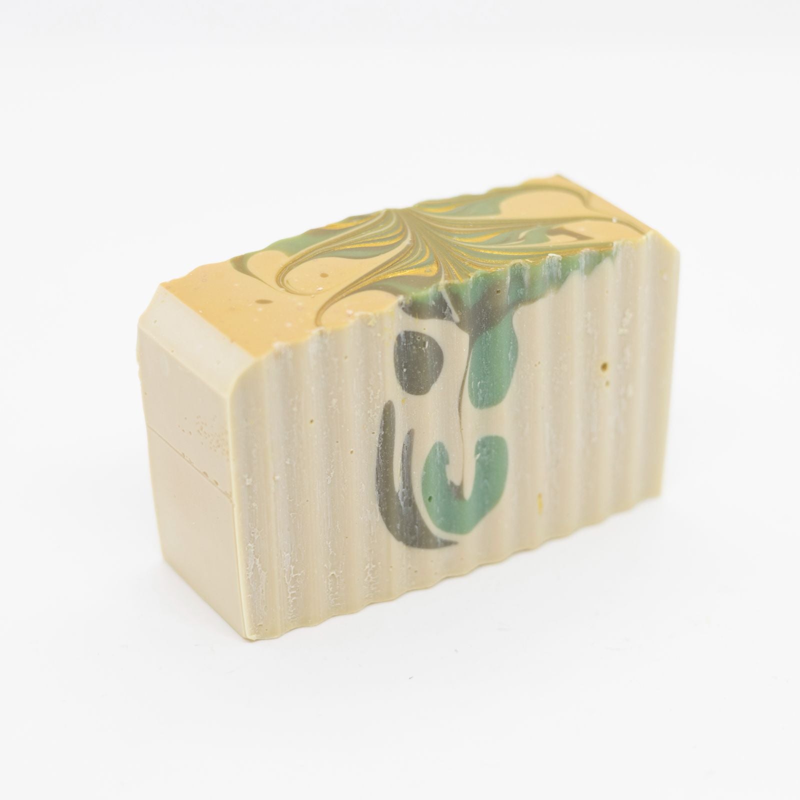 Commando Shea Butter Soap Bar with tan, green, and yellow design