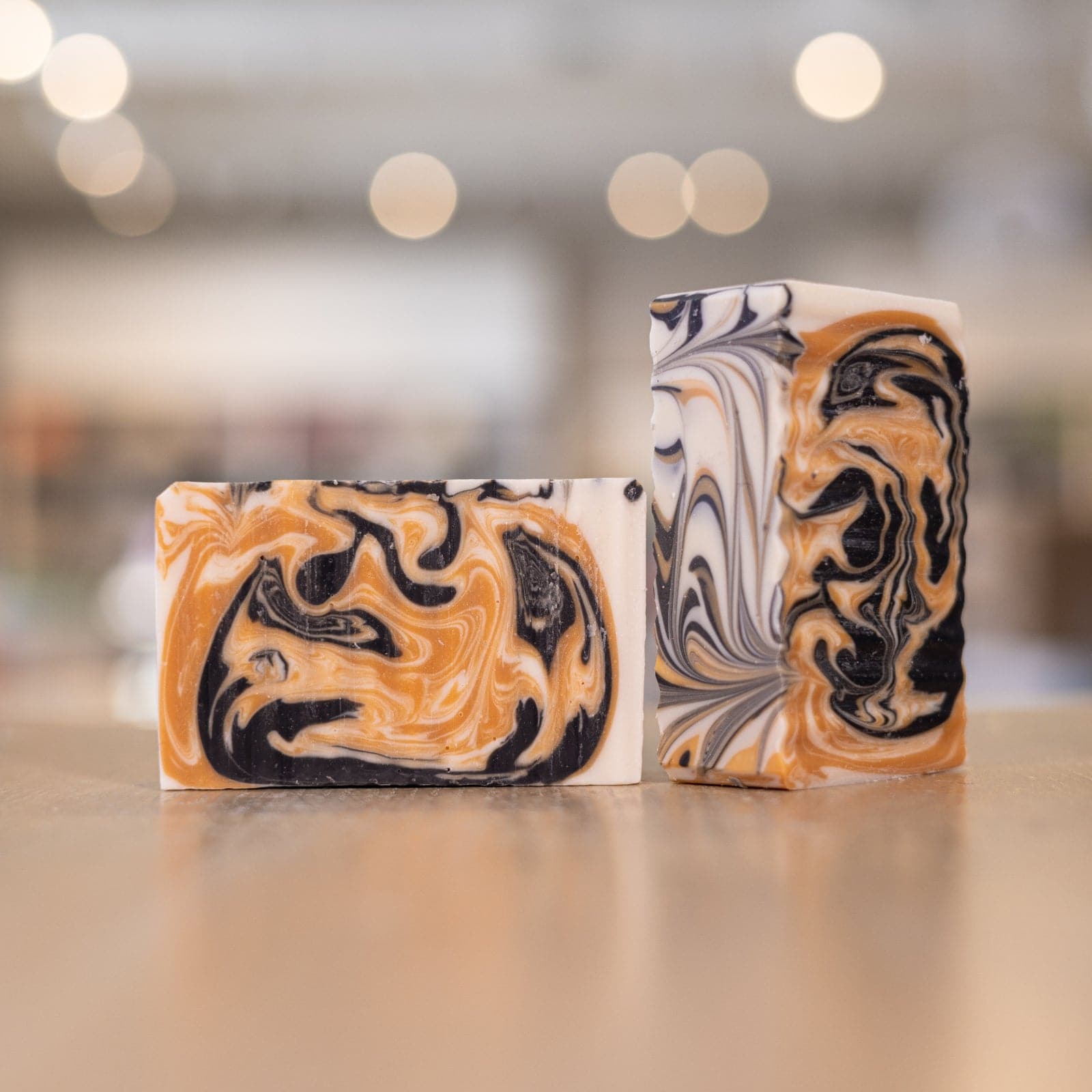 Two Ferocious Beast Soap Bars with white black and tan designs