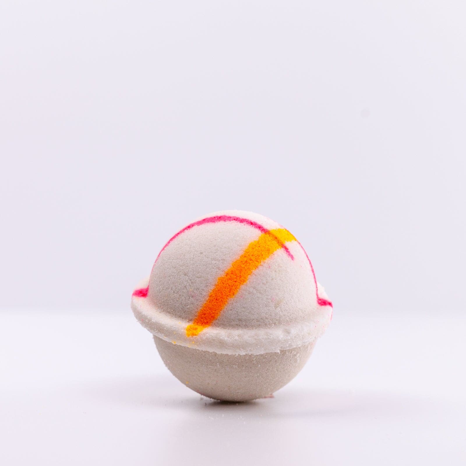 Island Nectar Bath Bomb with orange and pink design against white background