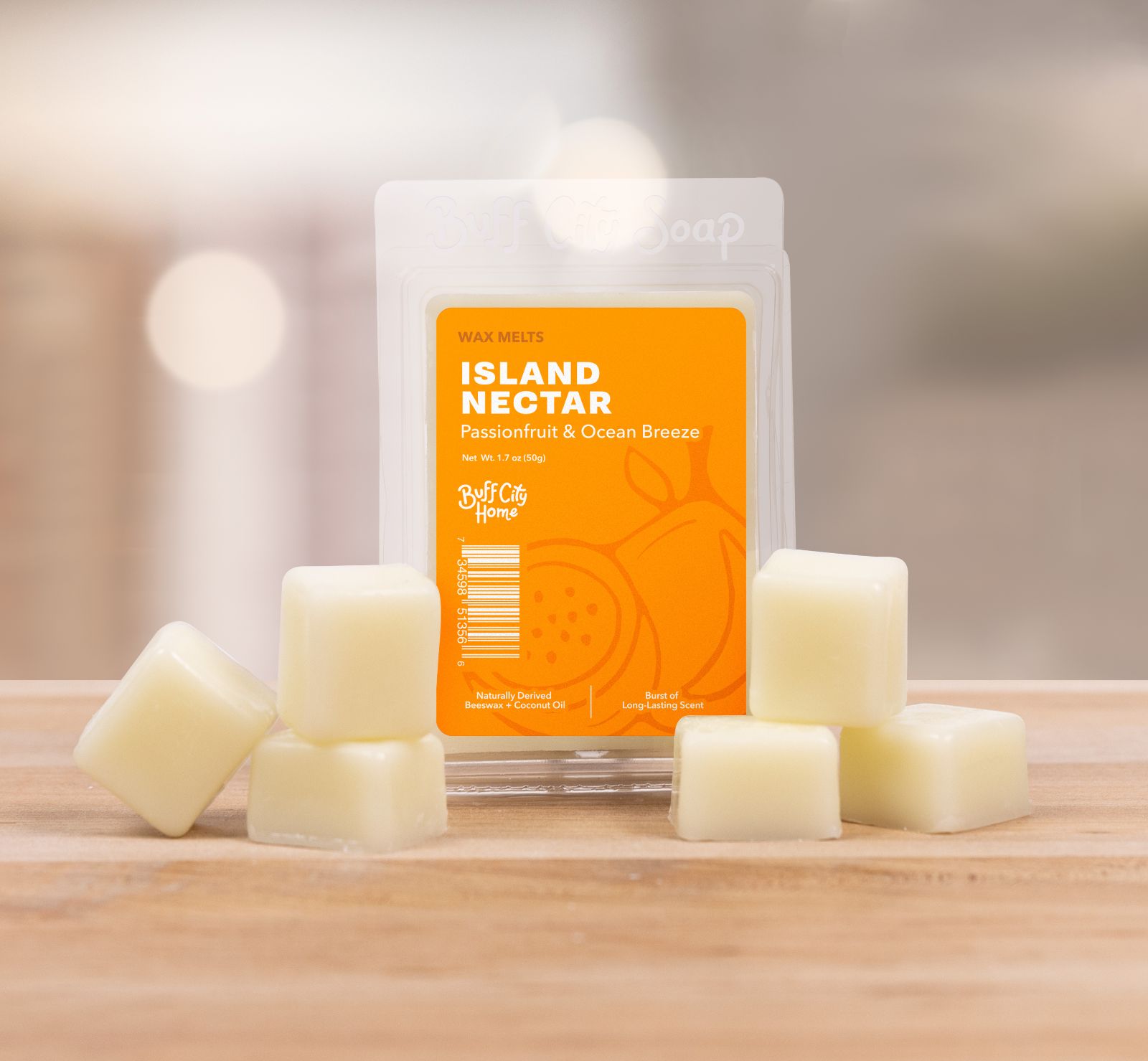 Buff City Soap square Island Nectar Wax Melts staggered in front of container 