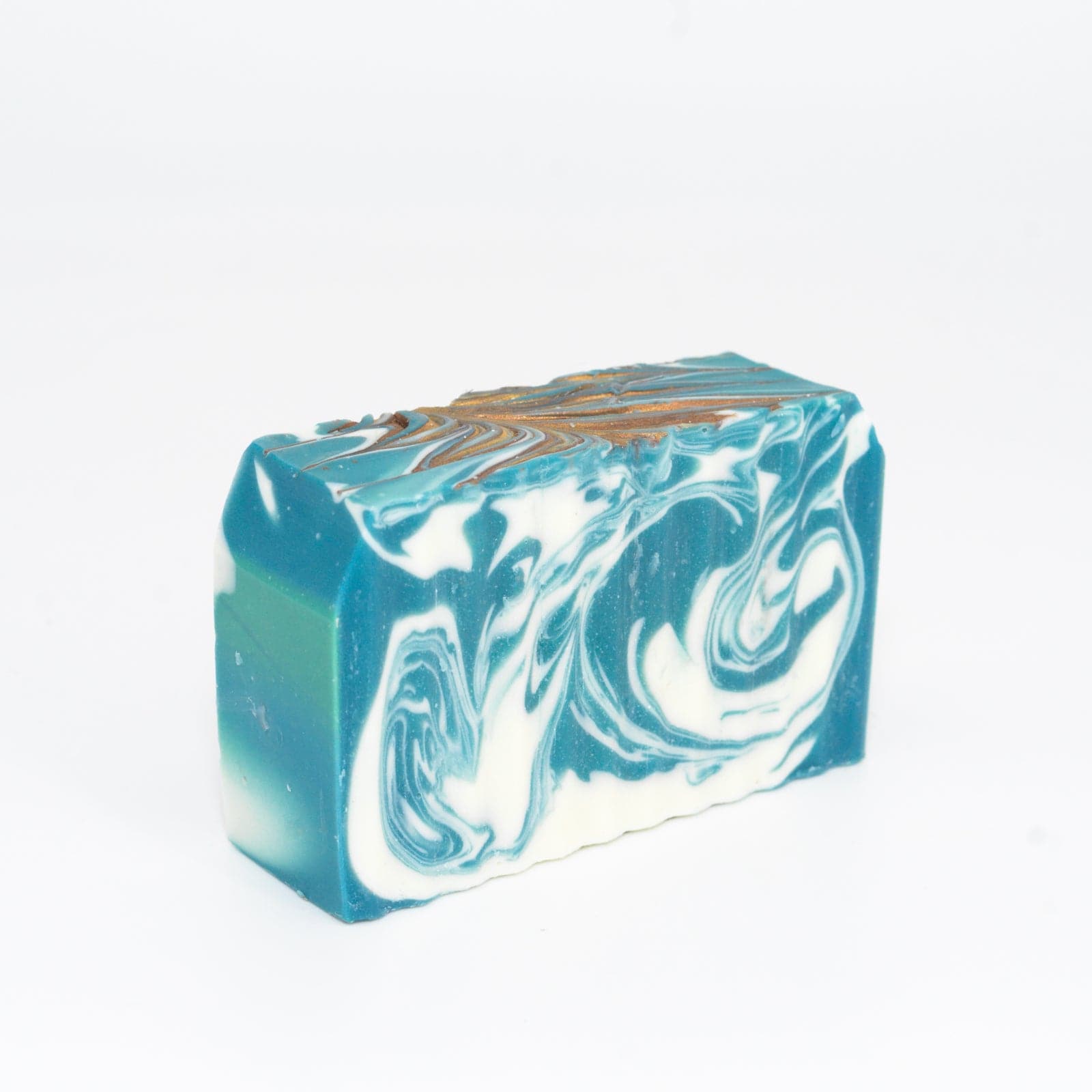 one bar of gold, blue, white and brown soap in the scent Magnolia
