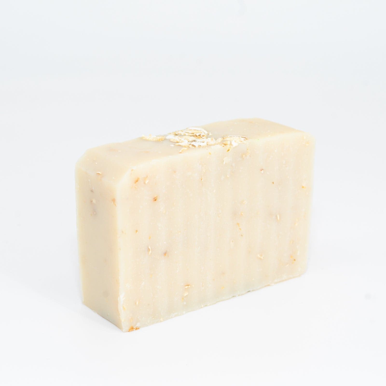 Bar of Oatmeal Honey Shea Butter Soap placed on side