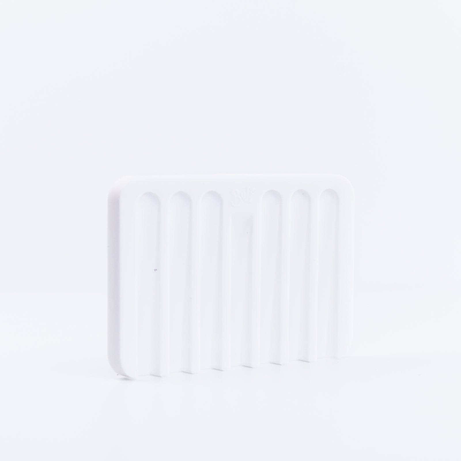 White Silicone Soap Dish placed on its side